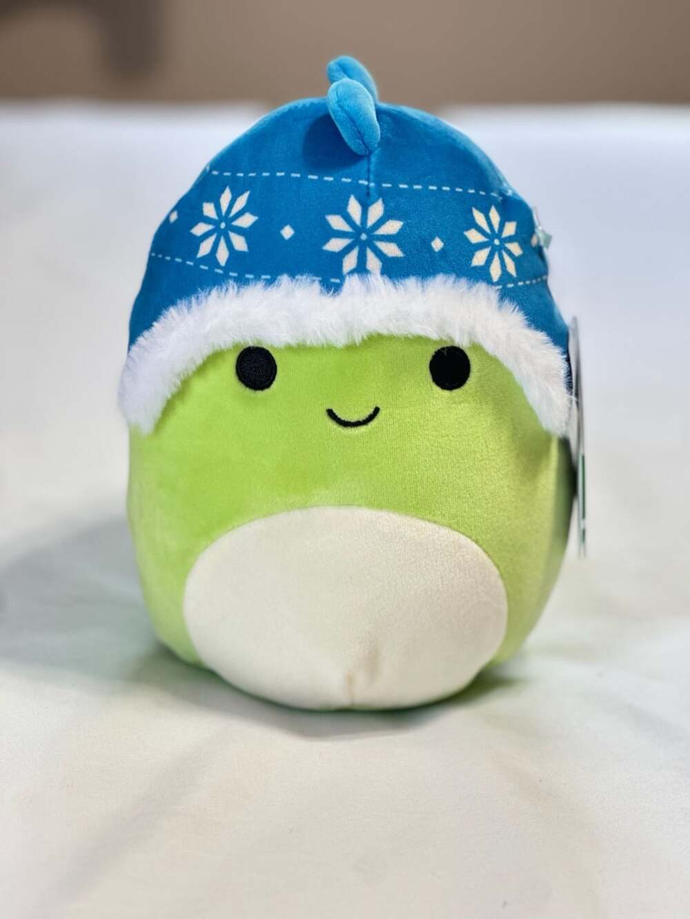 Squishmallows Danny the Green Dinosaur with Blue Winter Hat 7.5-inch Plush